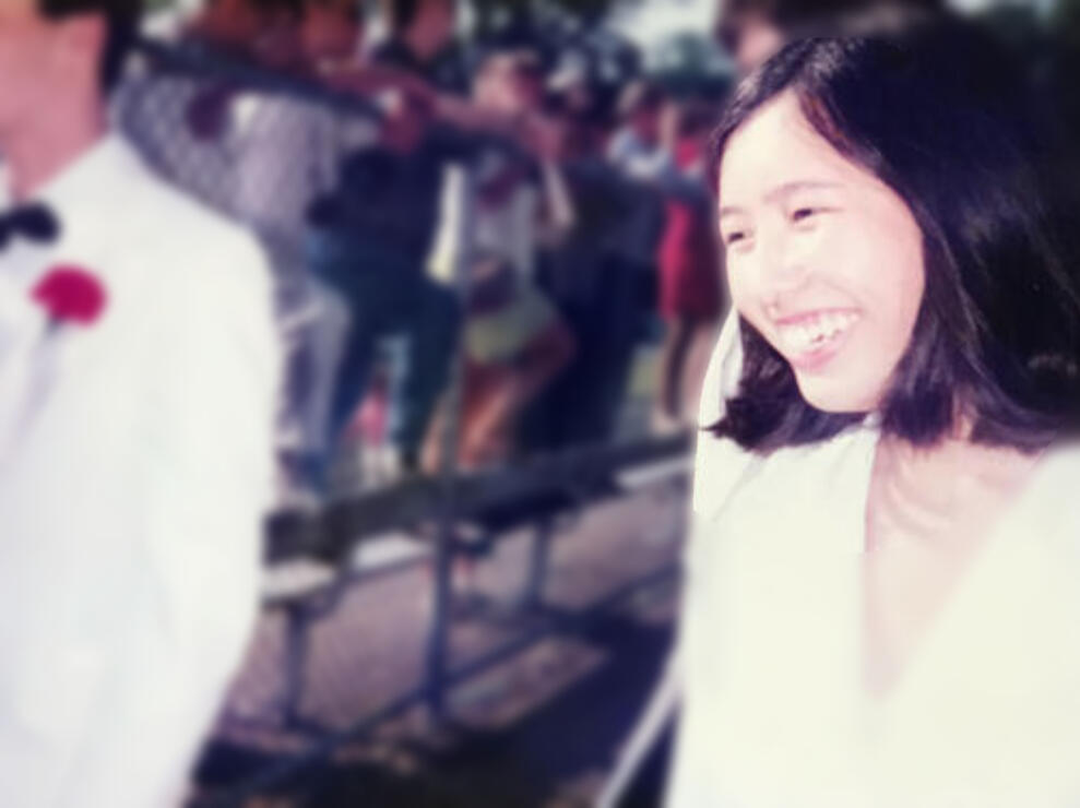 Image from high school graduation. My sister's friend's parents took this picture. My parents were not at my graduation. I don't know if I told them I was graduating. My first smile in years upon realizing I no longer had to be in school and depressed.